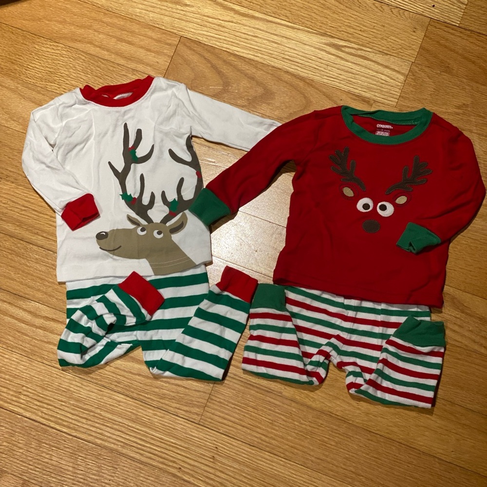 2 matching Christmas Pj sets Size 12 months